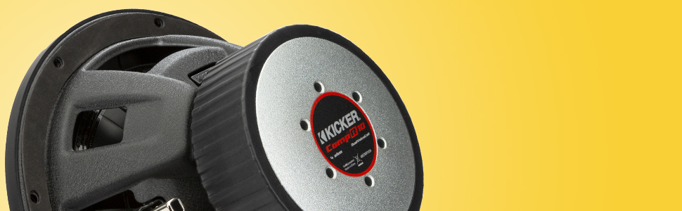 Rear three quarter view of KICKER CompR subwoofer showing magnet, basket and backplate