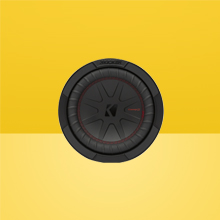 Front view of KICKER CompR 8 inch Subwoofer on two-tone yellow background