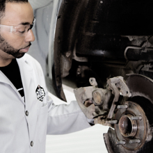 Technician replacing a rotor